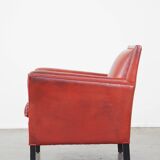 Fauteuil peint en rouge en cuir de mouton