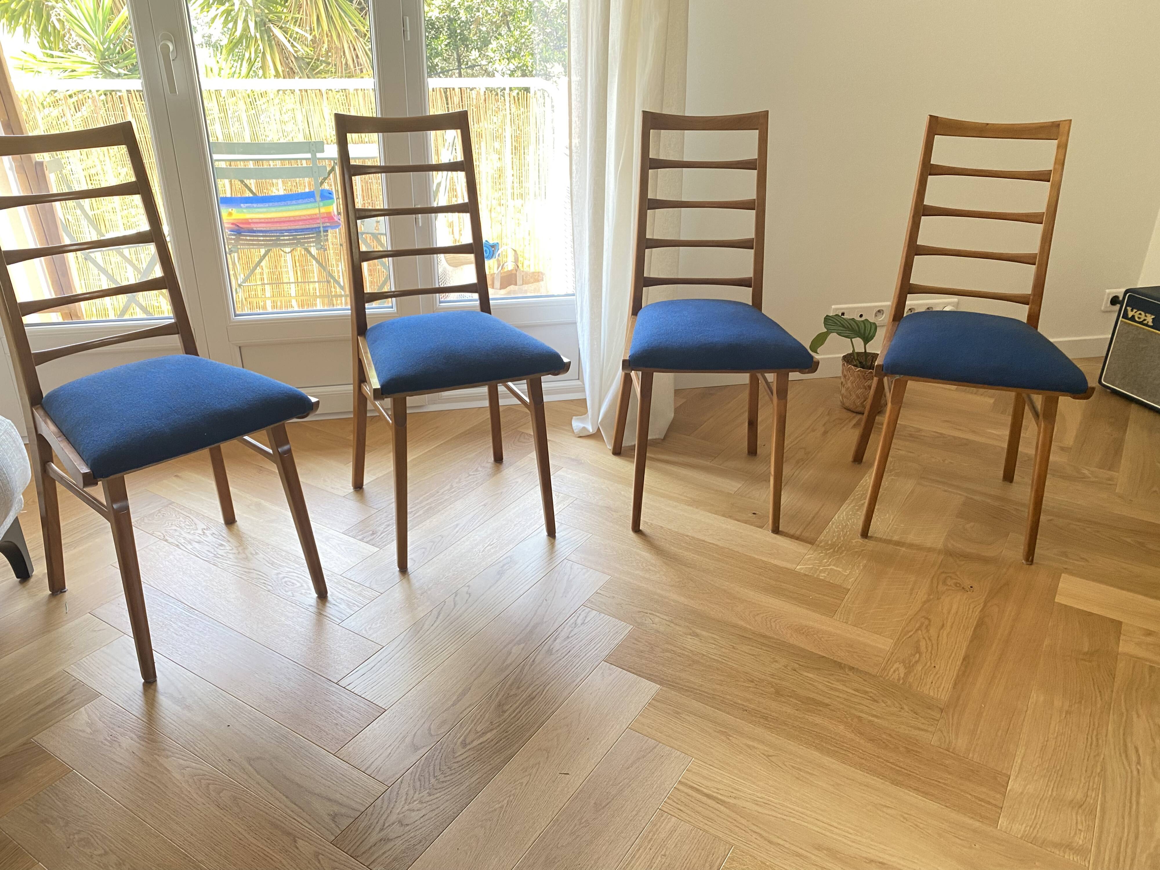 Set of 4 vintage Scandinavian chairs from the 1960s with ladder back.