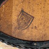 Hammered iron coffee table with circular wooden top