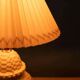 Vintage table lamp in woven ceramic Regency style.