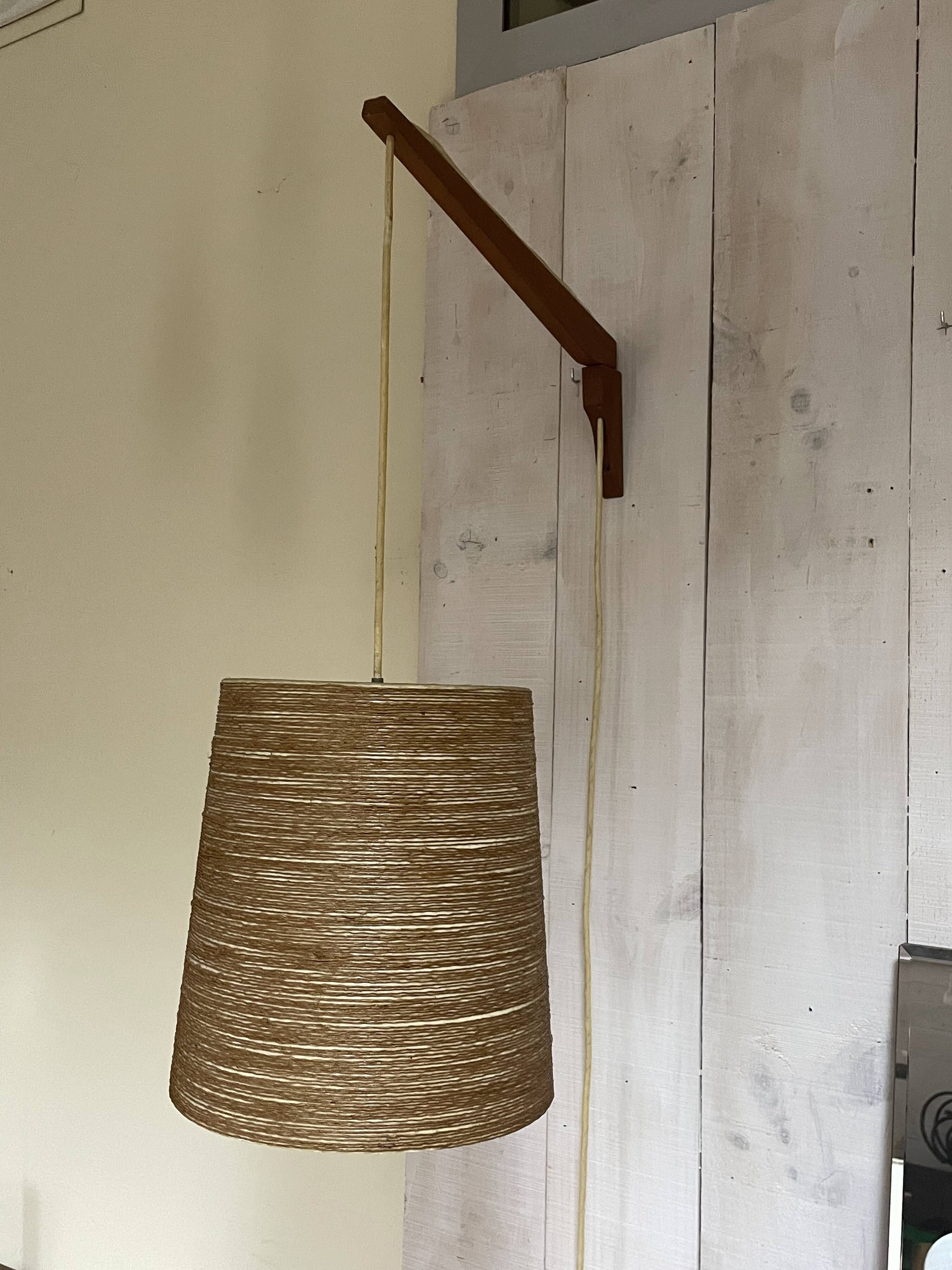 Rare teak and sisal wall lamp from the 1960s, attributed to Lotte Bostlund.