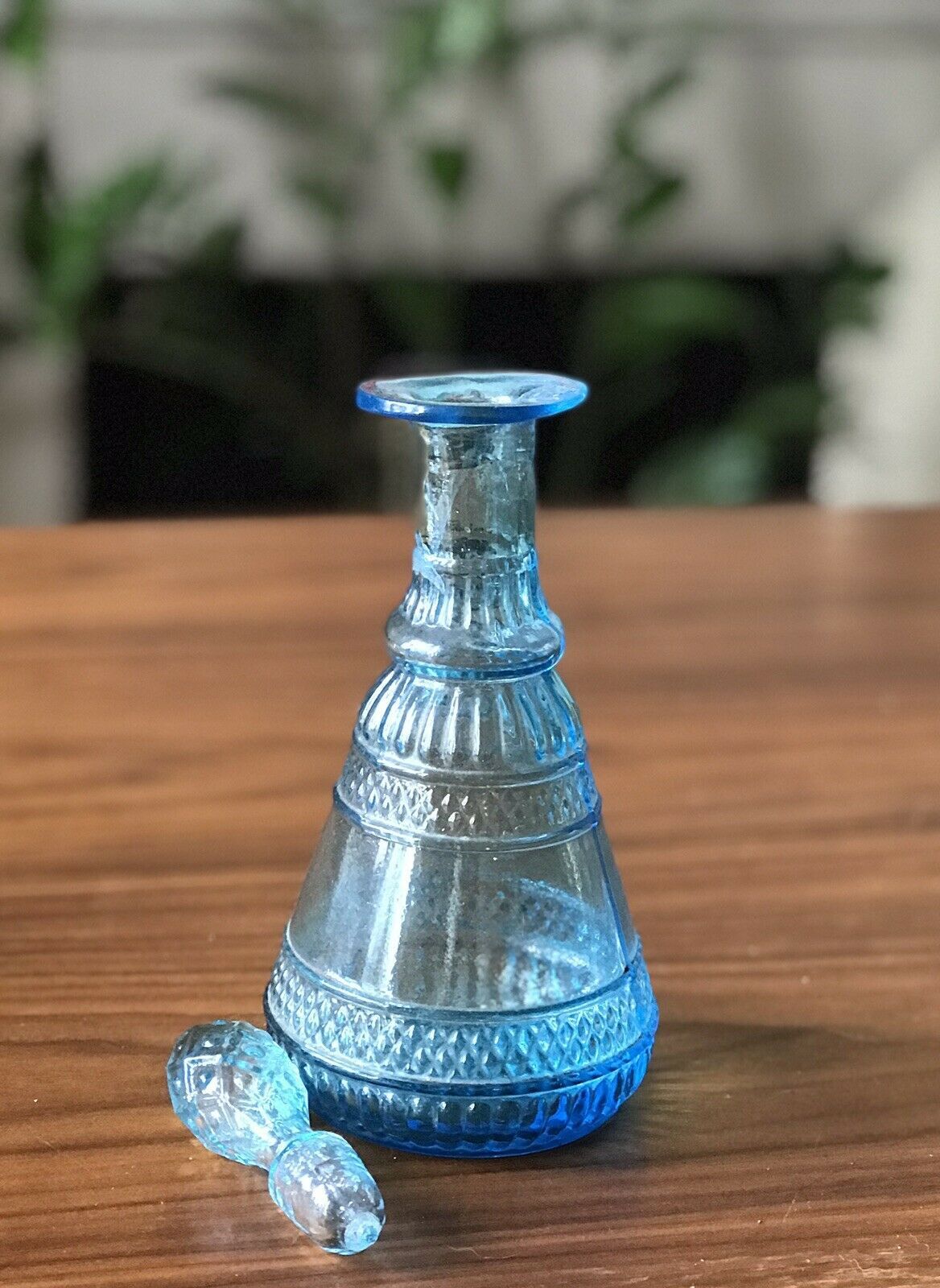 Carafe in blue chissed glass  and its pine cone-shaped cap