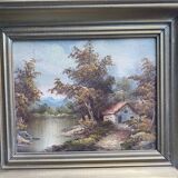 Vintage landscape painting with a house signed GIAN.