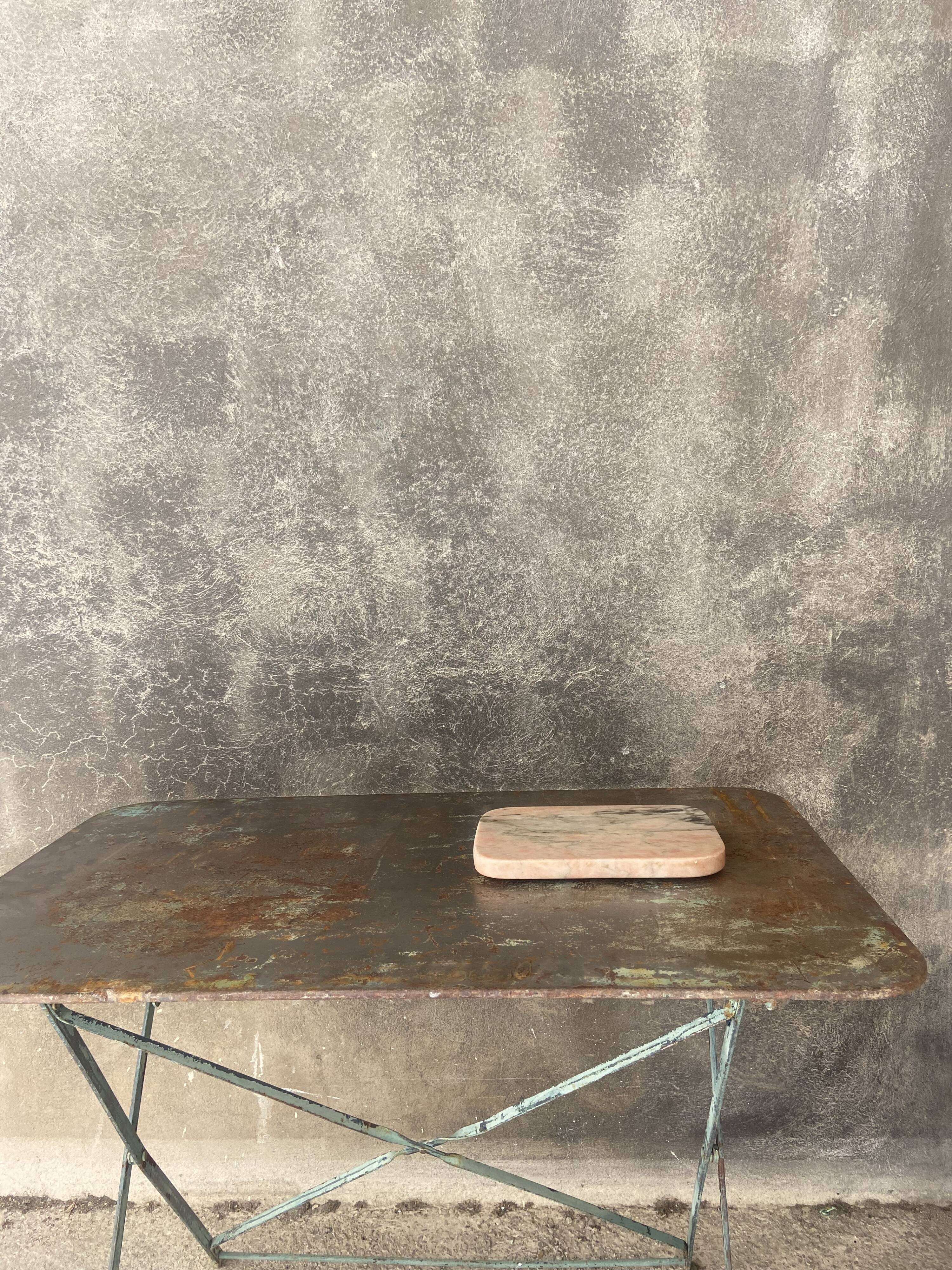 Cutting board in pink natural marble