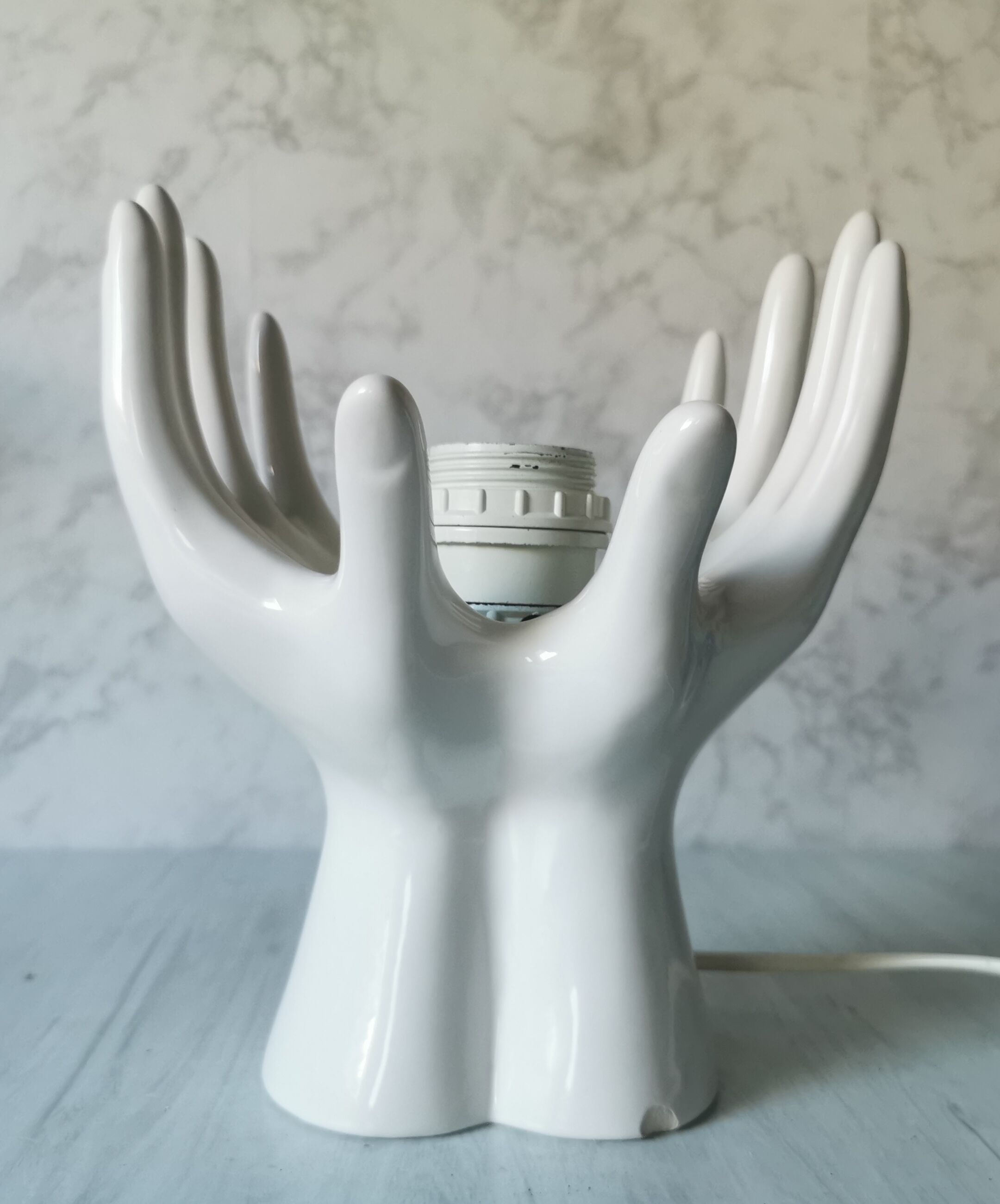 White ceramic hand lamp