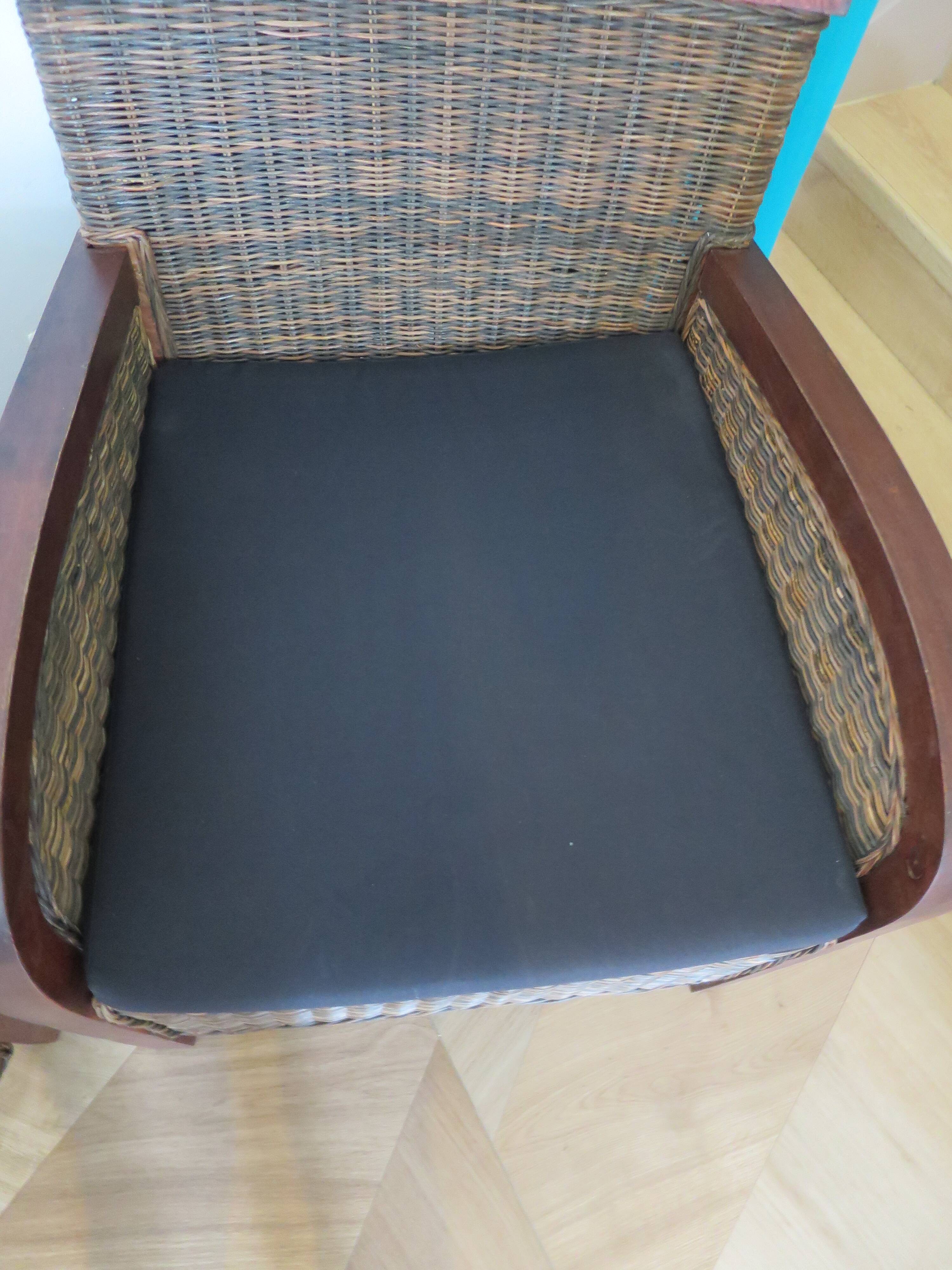 2 colonial-style armchairs in woven rattan and exotic wood