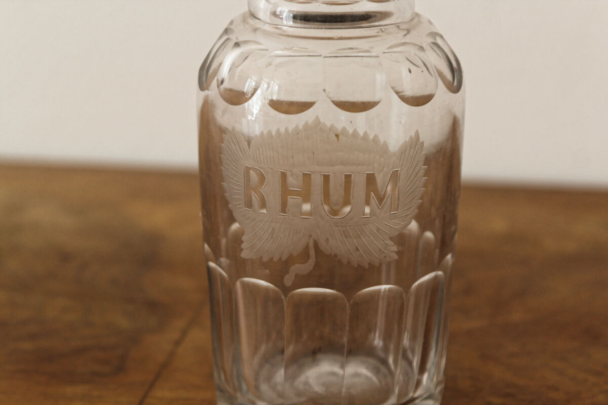 Chiseled glass rum bottle