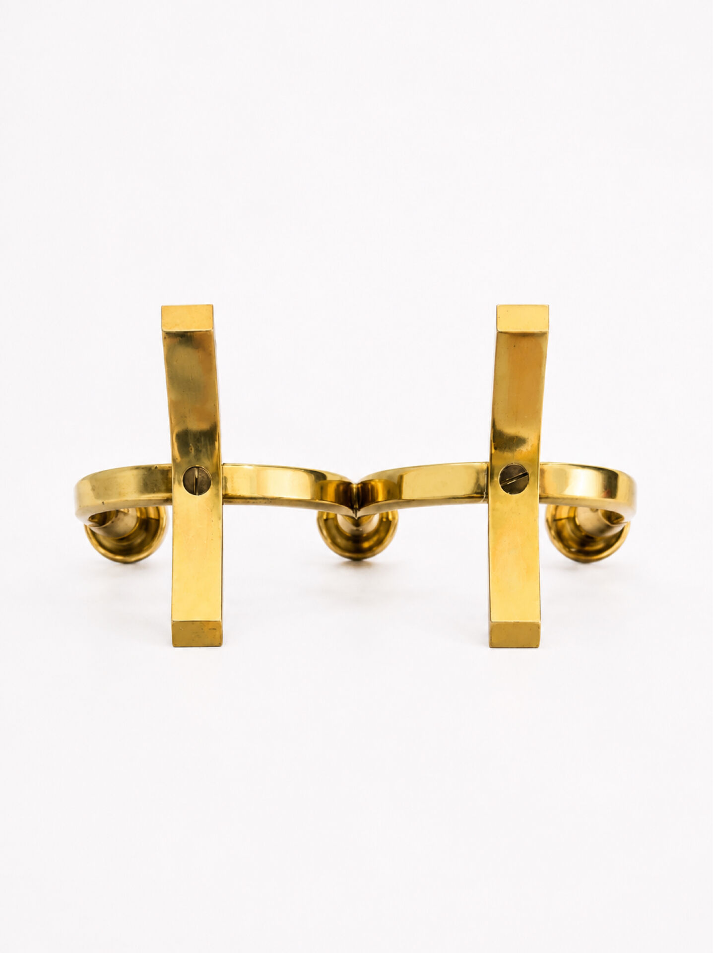 Candelabrum in brass attributed to Gunnar Ander, Ystad, Sweden, mid-20th century.