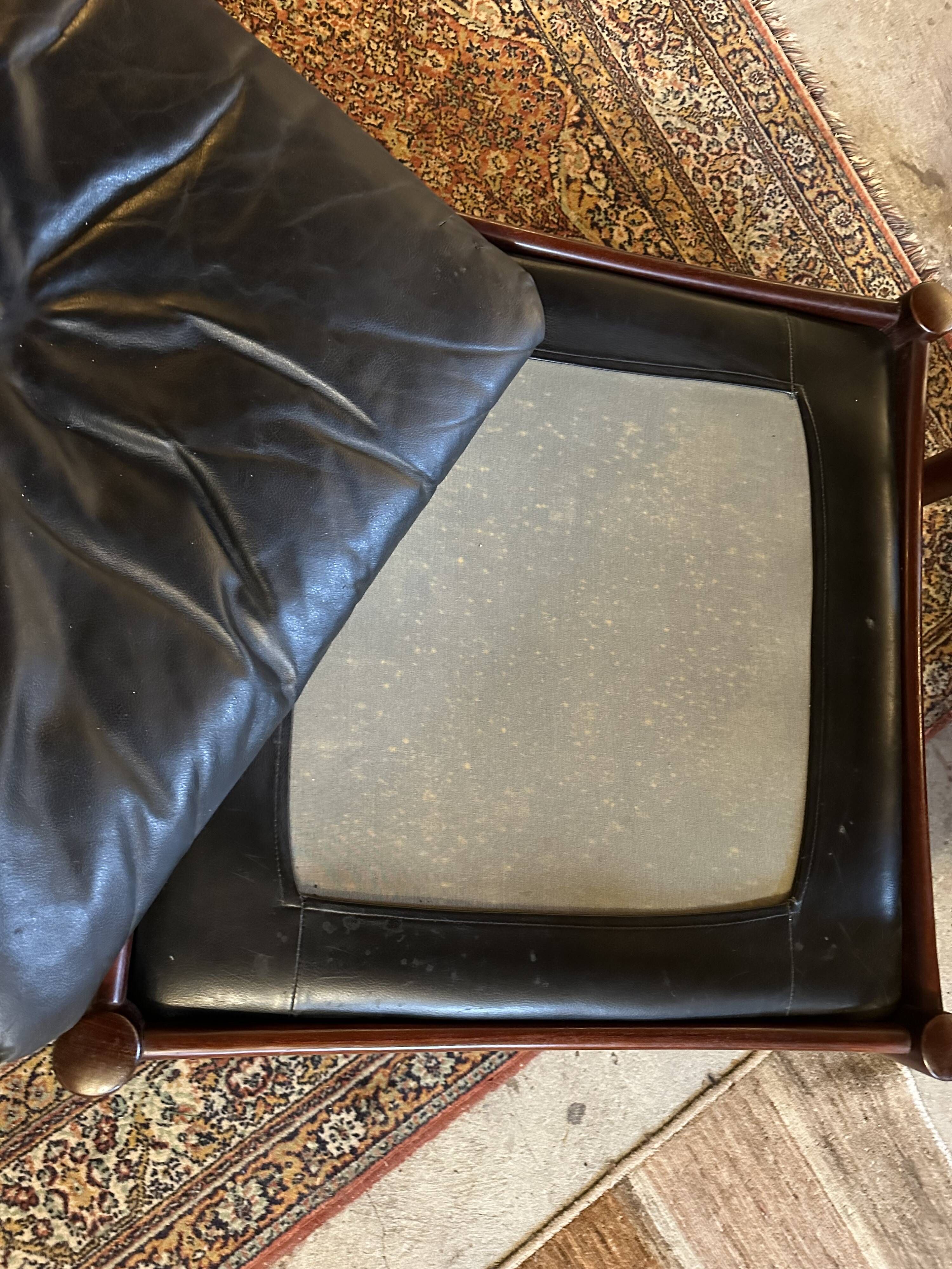 Admiral armchair and its ottoman by Erik Merthen Sweden vintage 1960