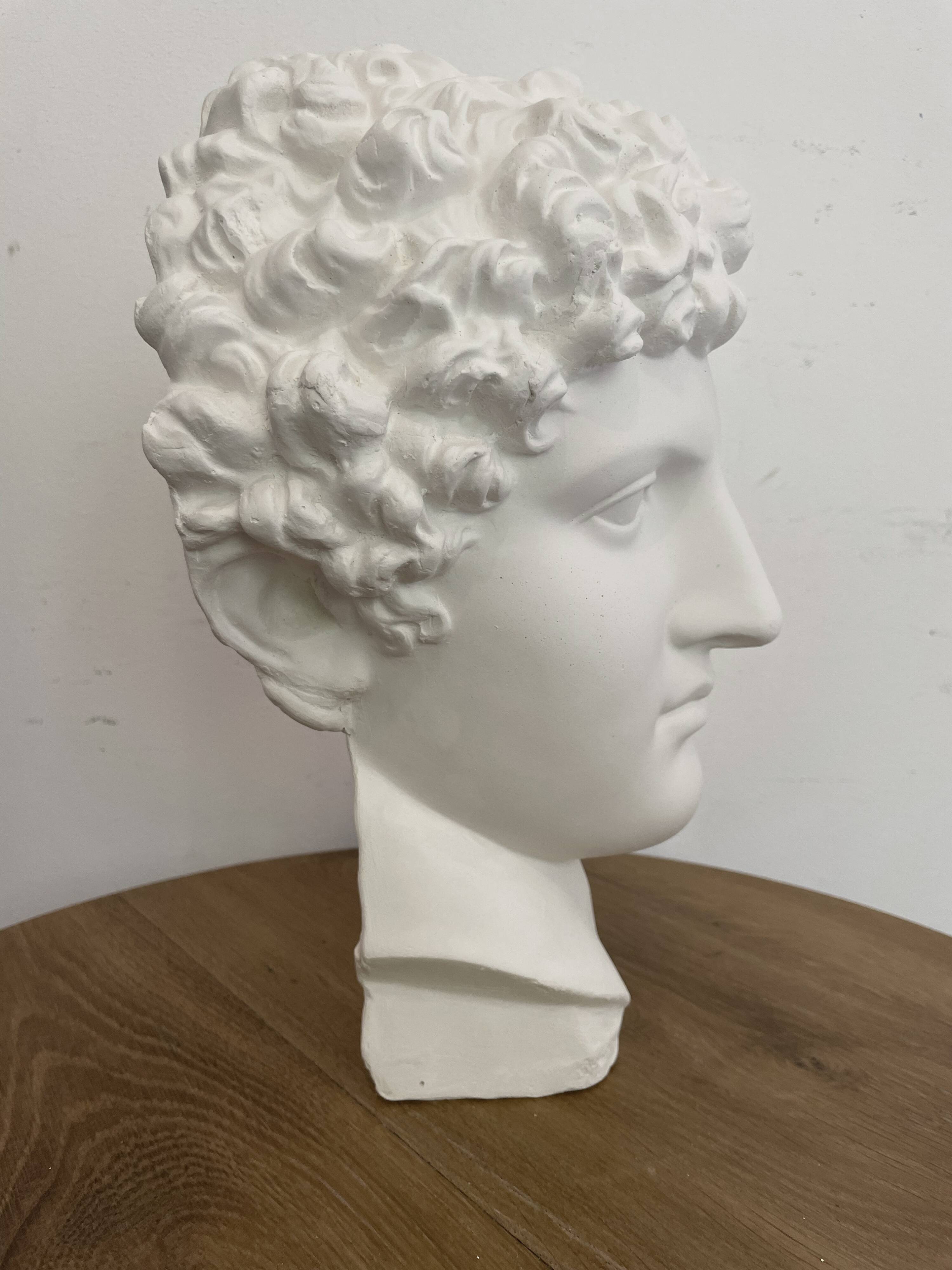 White plaster Greek head