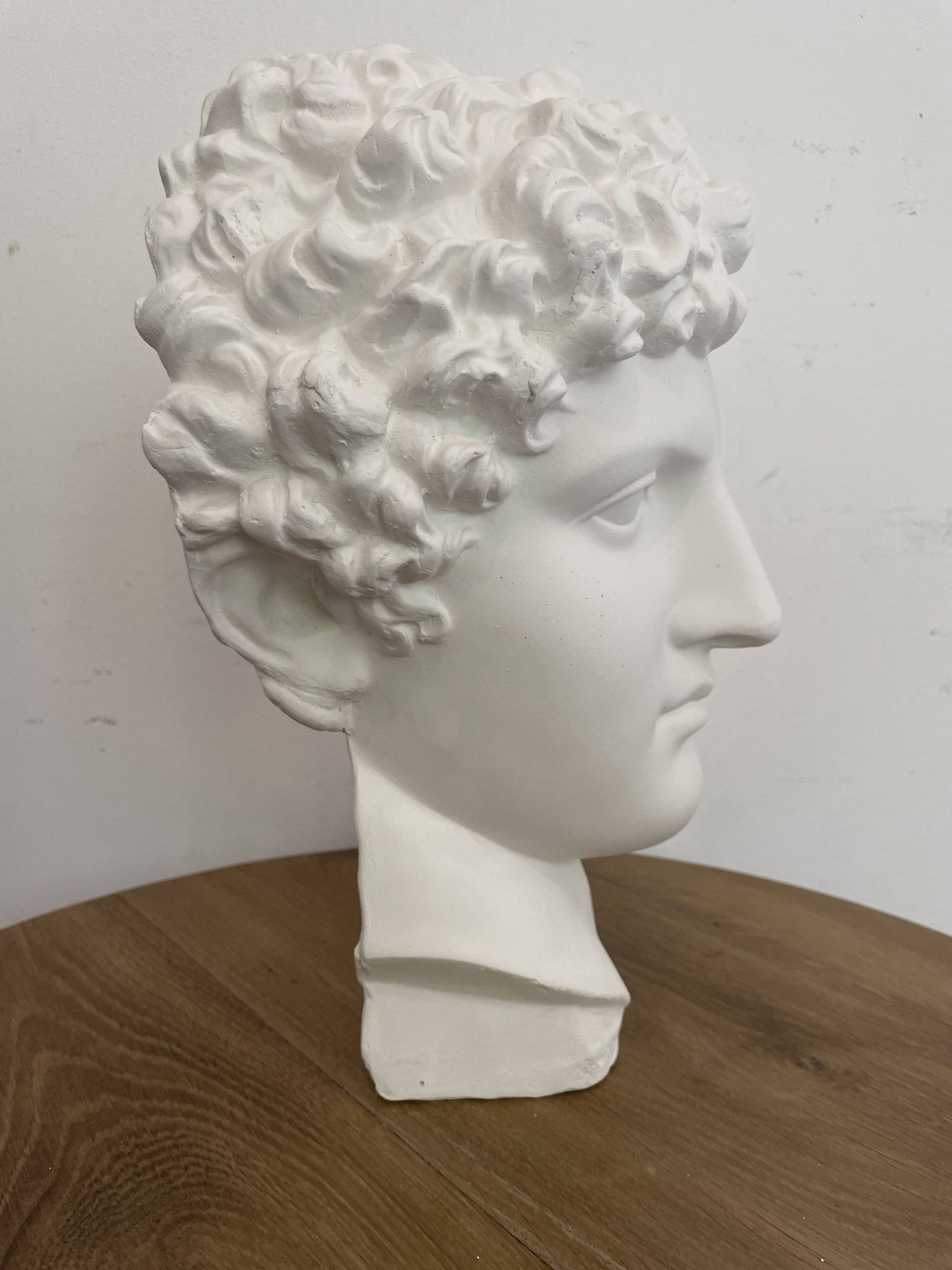 White plaster Greek head