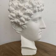 White plaster Greek head