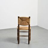 Paire de chaises modèle Bauche par Charlotte Perriand, circa 1950