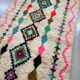 Moroccan Berber rug in ecru with multicoloured diamonds and bright pink – 240 × 139