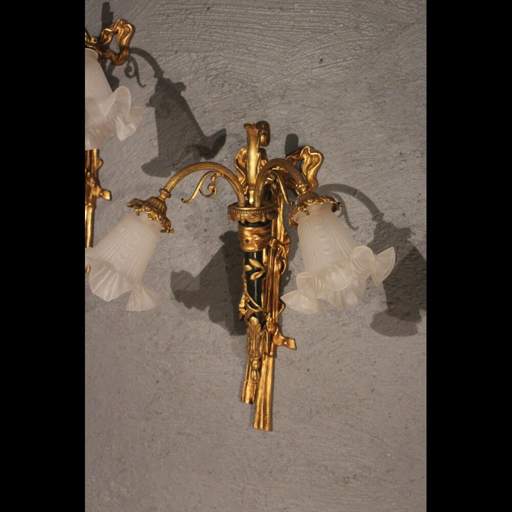 Series of four Louis XVI appliques