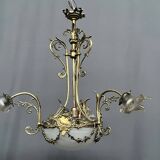 Lustre de style Louis XV. Bronze massif, cristal.