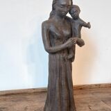 Sculpture representing a woman holding a child - original terracotta