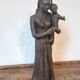 Sculpture representing a woman holding a child - original terracotta