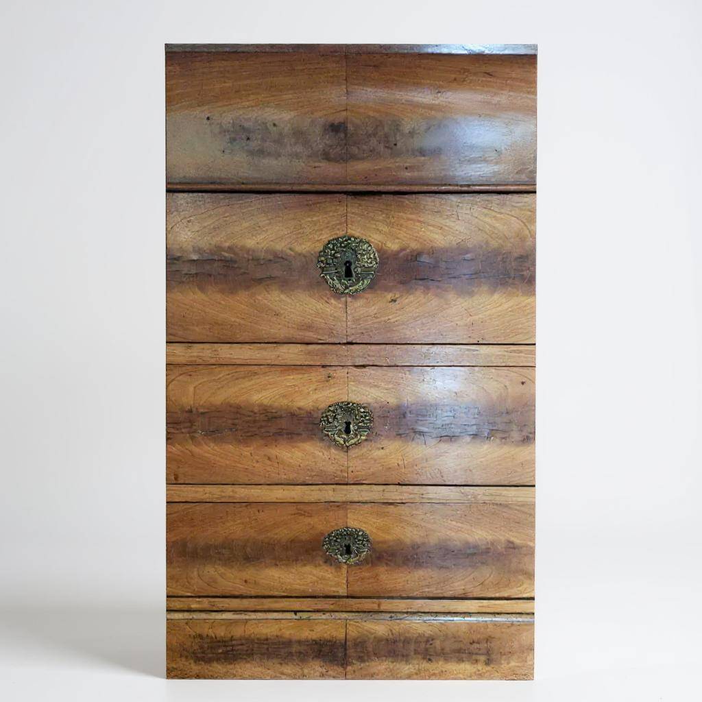 Chest of drawers in walnut and walnut veneer with black veined marble top