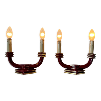 Pair of art deco candlestick lamps in burgundy earthenware and vintage gold ceramic 1930 pose