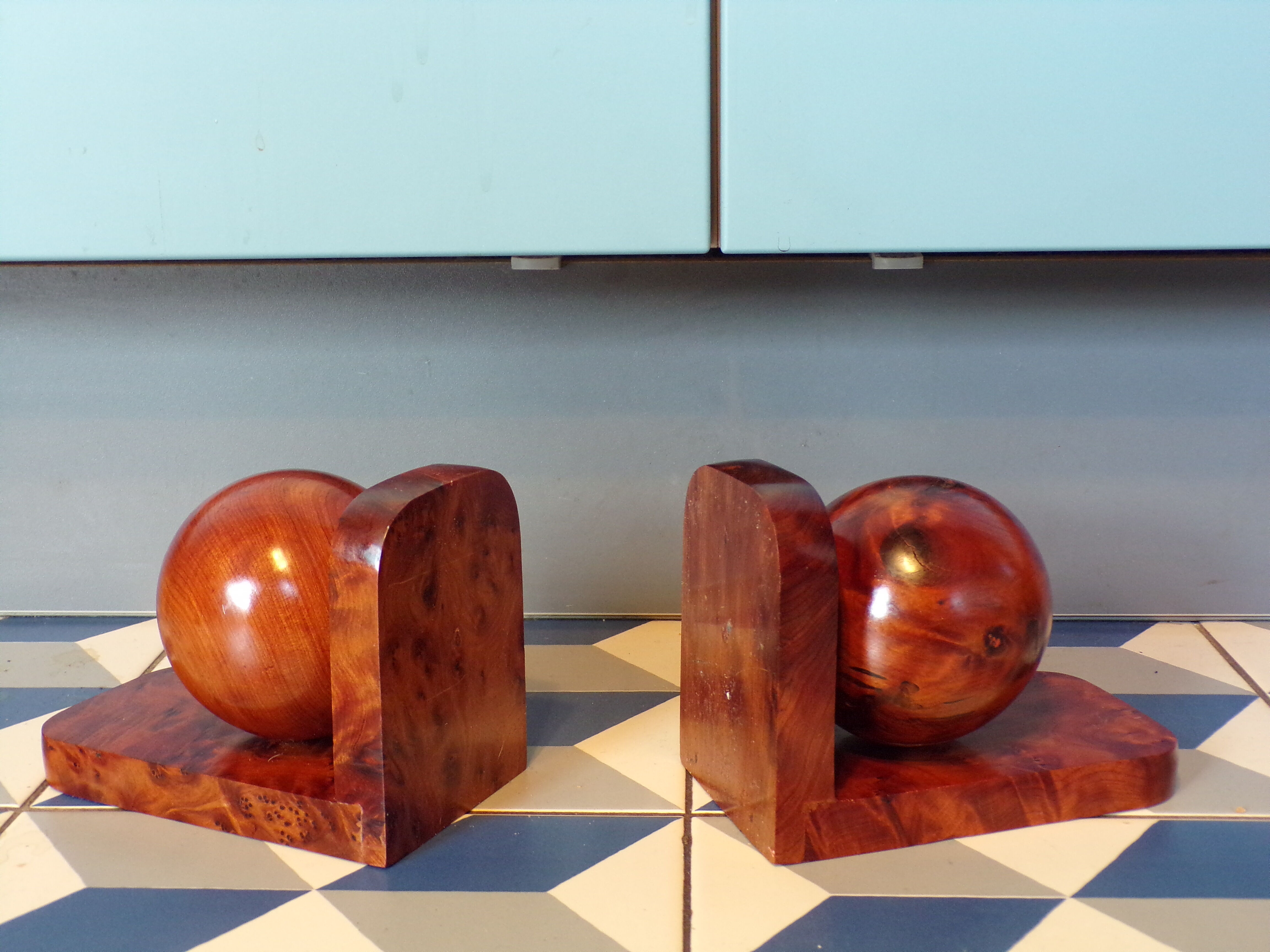Pair of art deco bookends in thuya magnifying glass