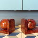 Pair of art deco bookends in thuya magnifying glass