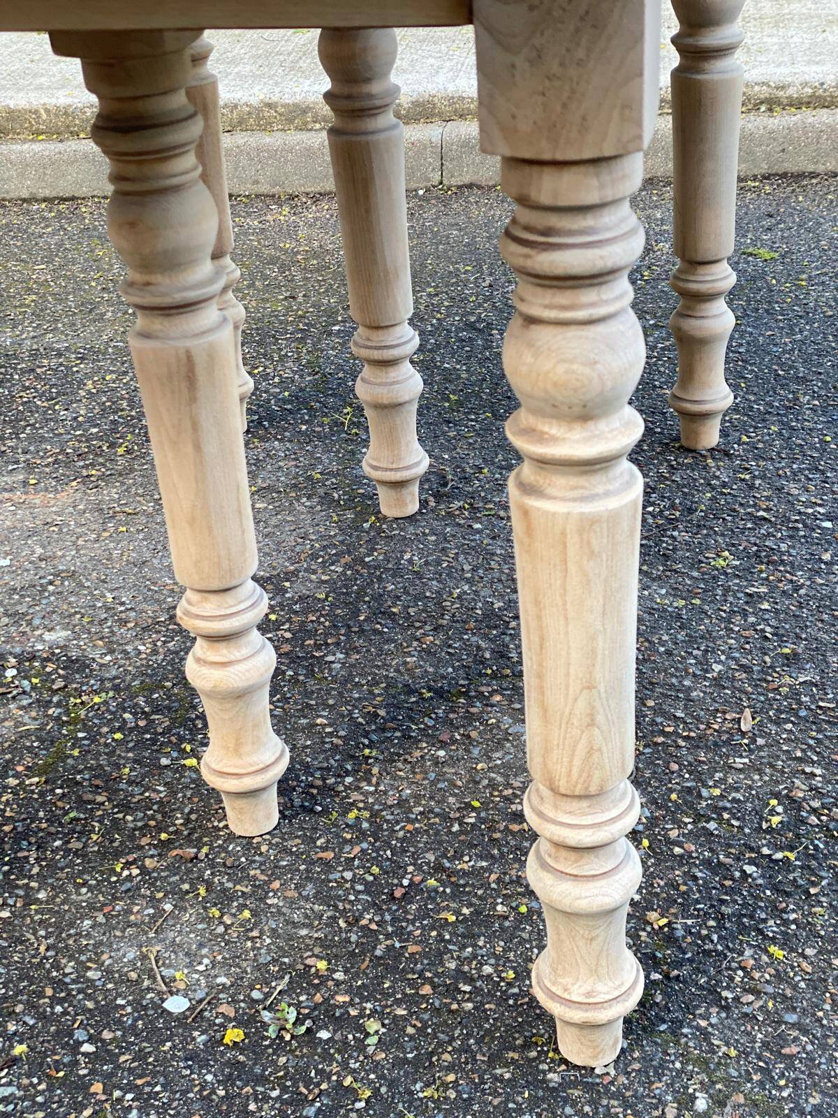 Renovated Louis Philippe round extendable dining table with 4 leaves.