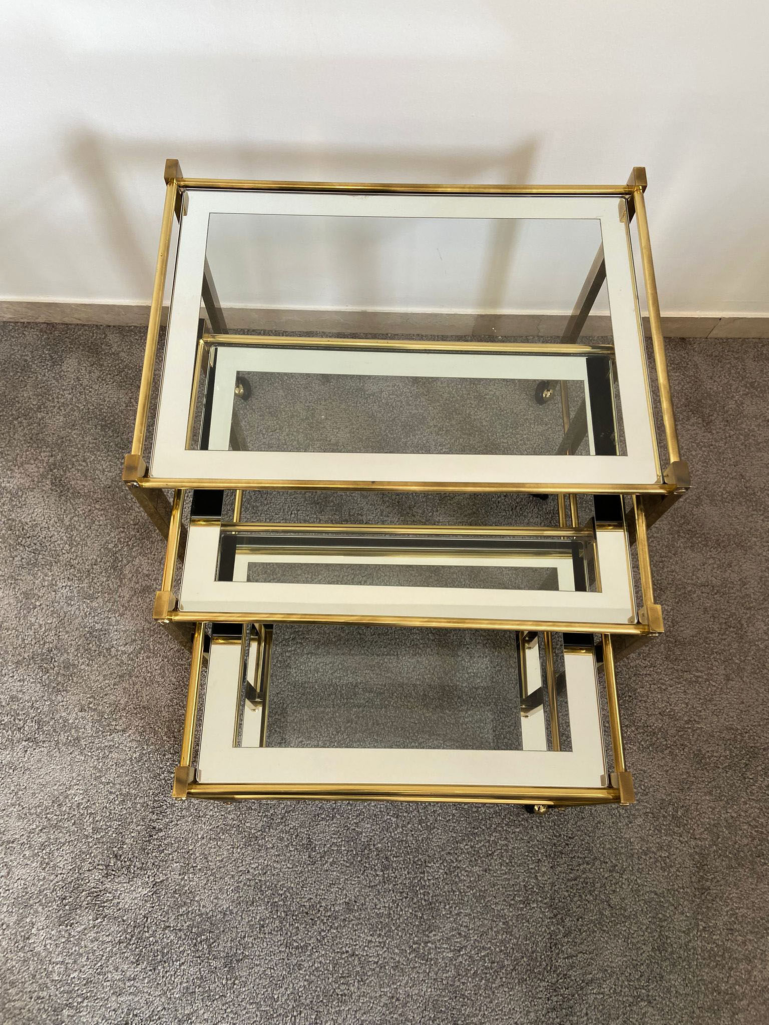 Trio of coffee tables "Nido" brass and glass Italy 70s
