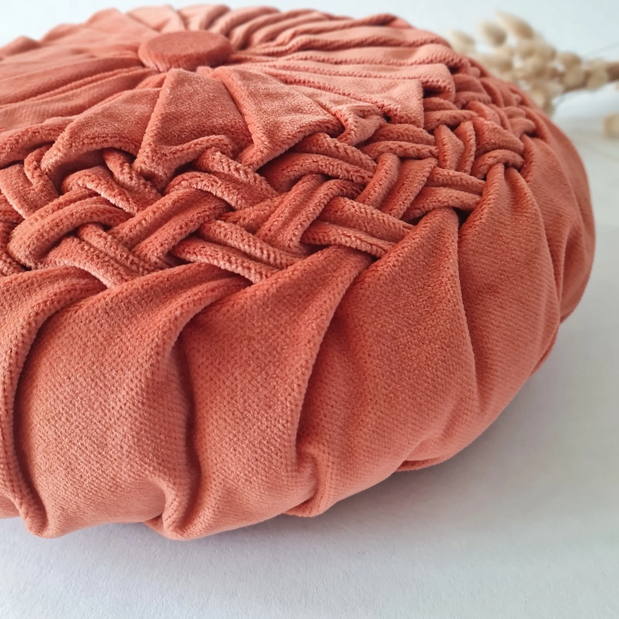 Pleated terracotta red velvet cushion