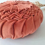 Pleated terracotta red velvet cushion