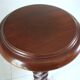 Saddle or walnut pedestal turned in twist