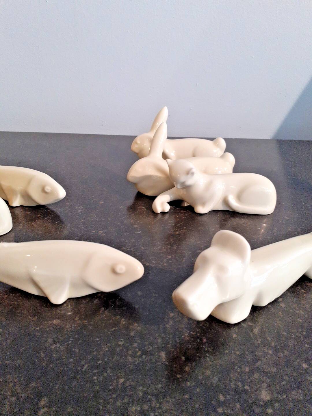 Set of 7 porcelain knife rests, animals, dog, cats, fish, rabbit.
