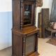 Two-body display cabinet in oak, Henri II style.