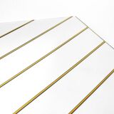 Large, exceptional 1970s brass wall mirror with diagonal mirror strips