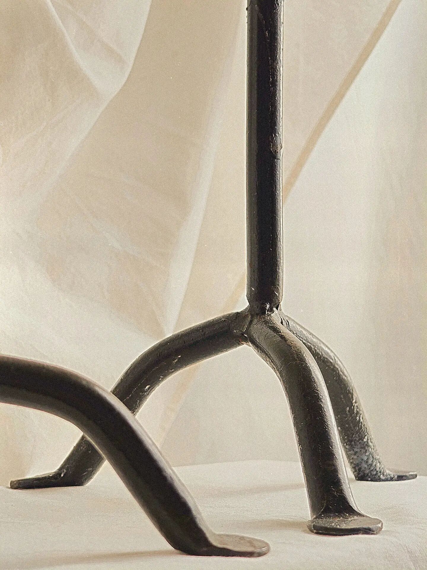 Pair of black cast iron floor candlesticks (candle holders)