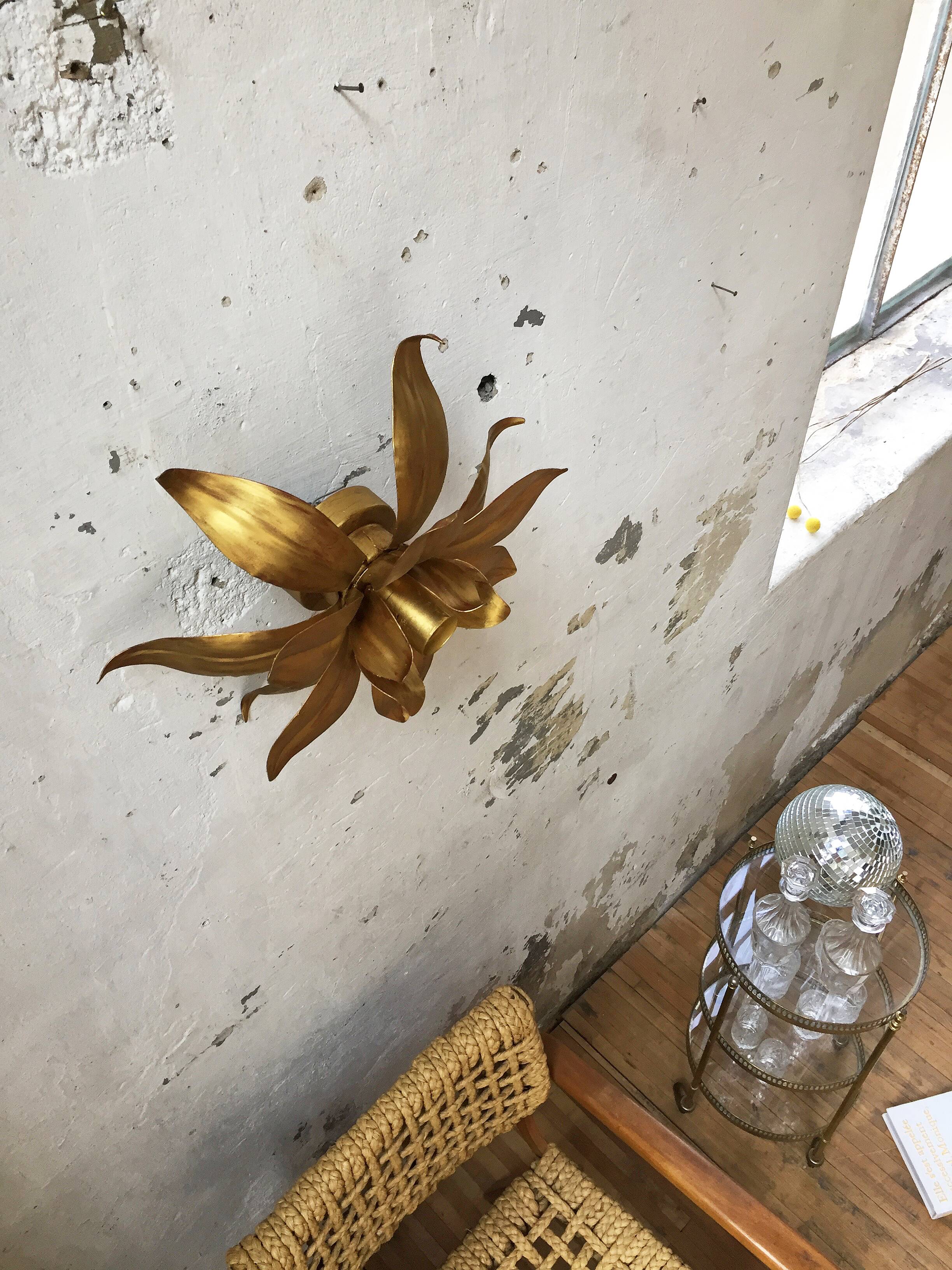 Old wall light flowered