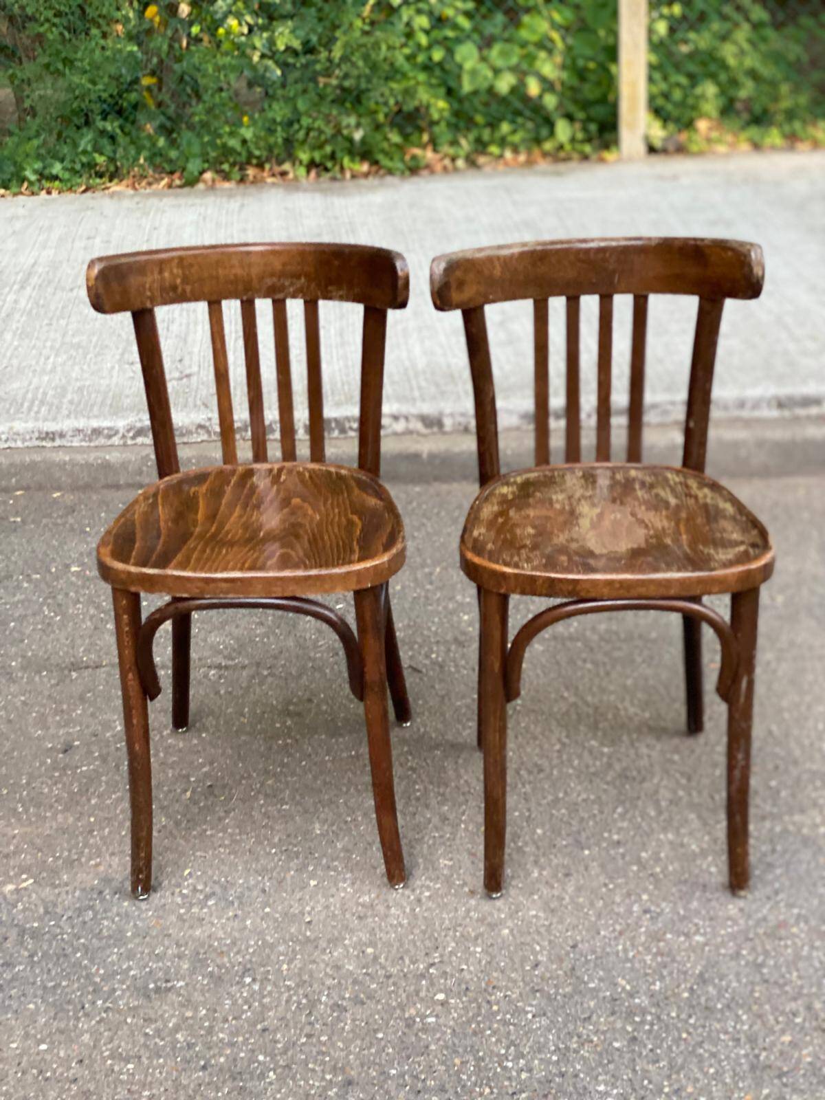 2 solid wood curved walnut bistro chairs in burgundy