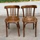 2 solid wood curved walnut bistro chairs in burgundy