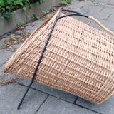 scandinavian  midcentury magazine holder in wicker and with metall legs