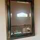 Miroir ancien style Napoléon III en bois noirci et doré – cadre d’orig