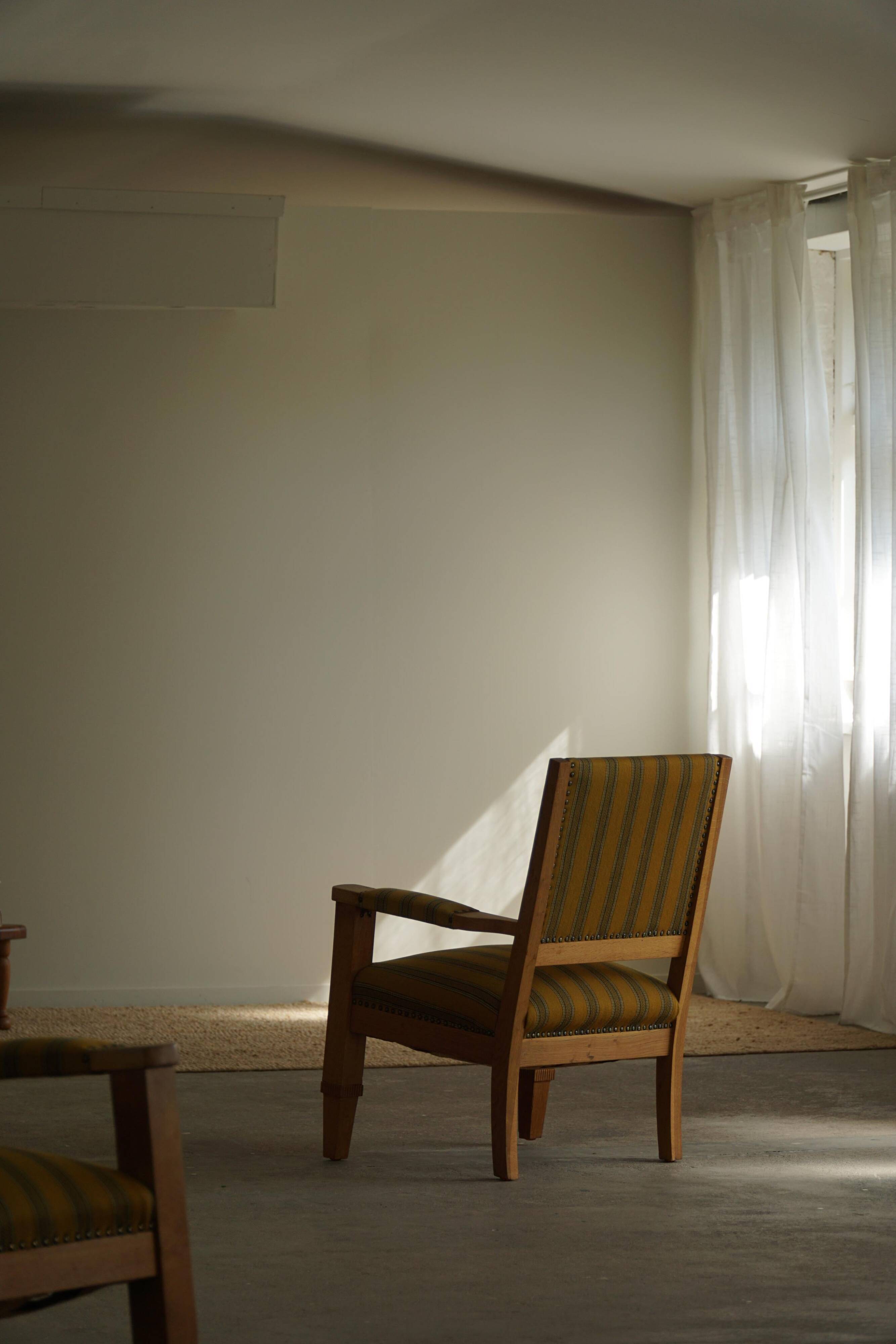 Pair of Art Deco armchairs in oak and fabric, Danish cabinetmaker, 1940s