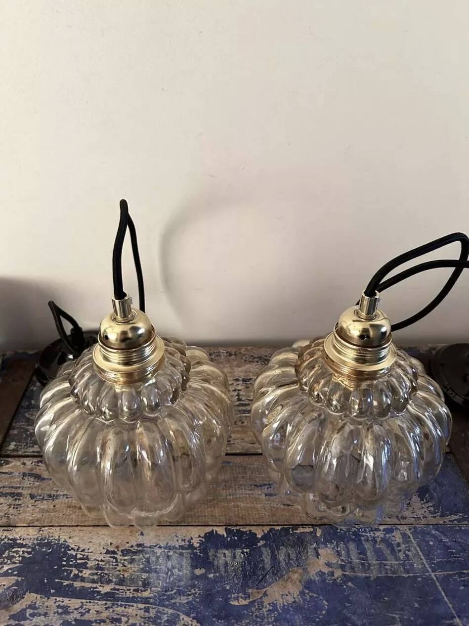 Pair of vintage amber glass pendant lights