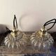 Pair of vintage amber glass pendant lights