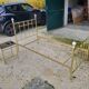 Vintage single bed and nightstand in gilded brass