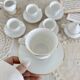 Vintage porcelain tea/coffee service with gold edging for 6 people, sugar bowl and milk jug