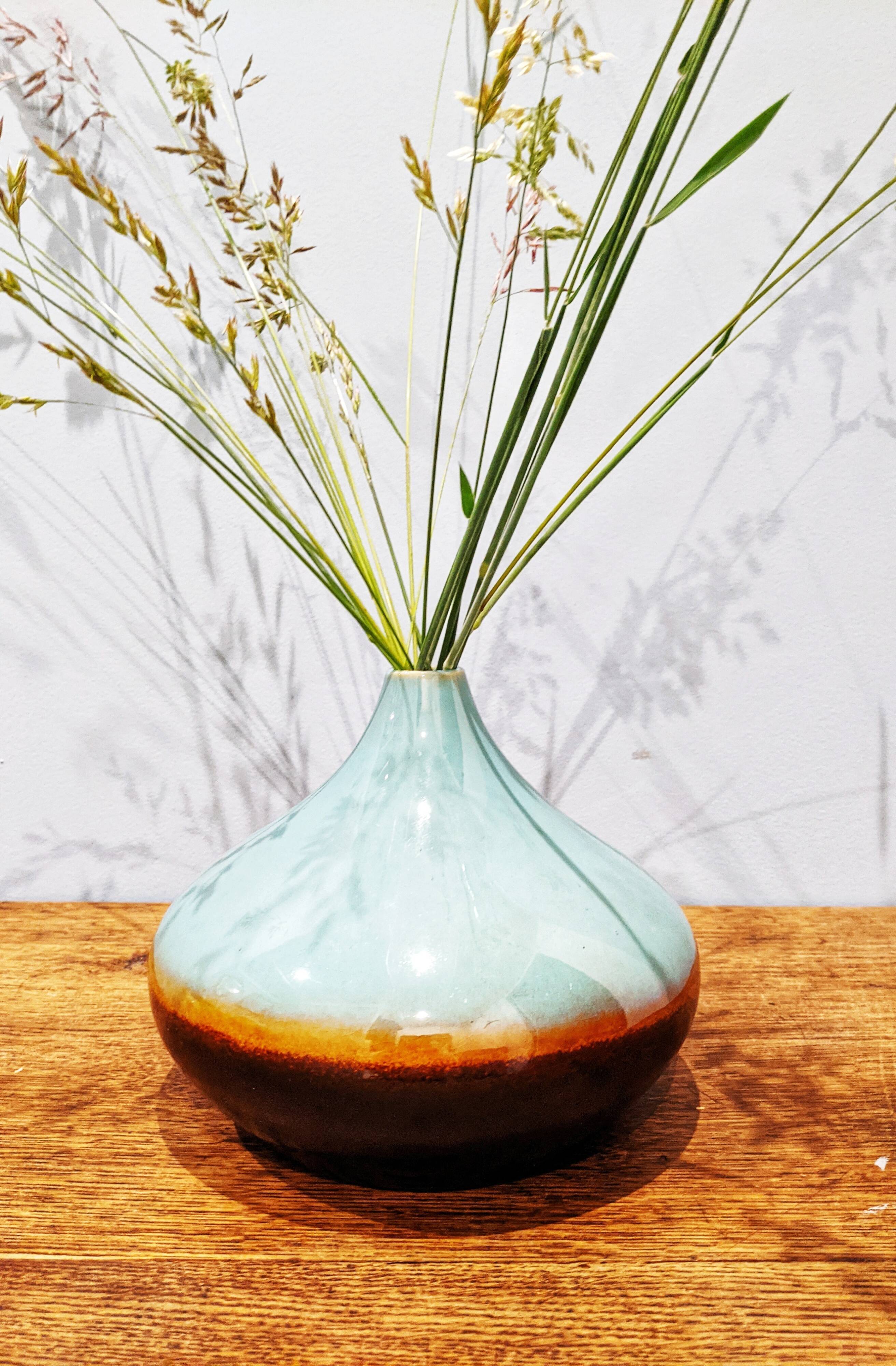 Turquoise and brown ceramic vase