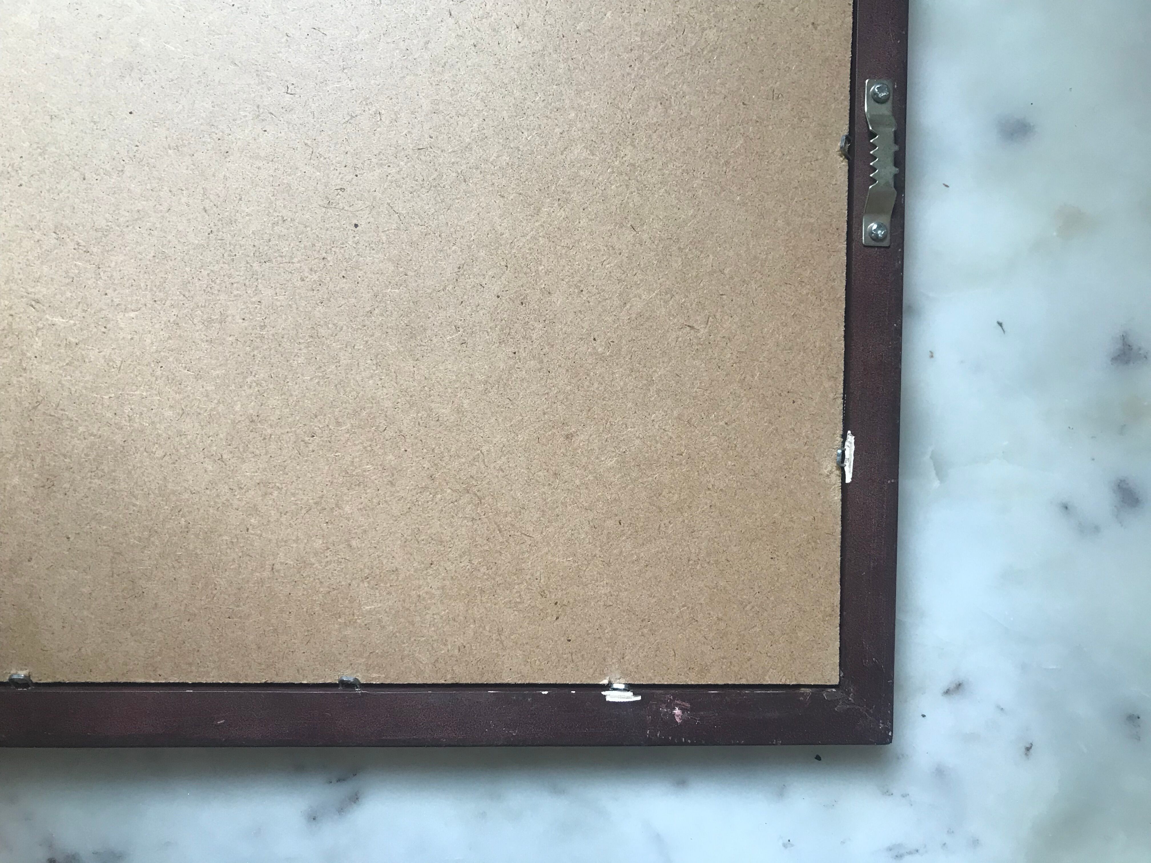 Illustration, former cover of Vogue Magazine, under golden frame