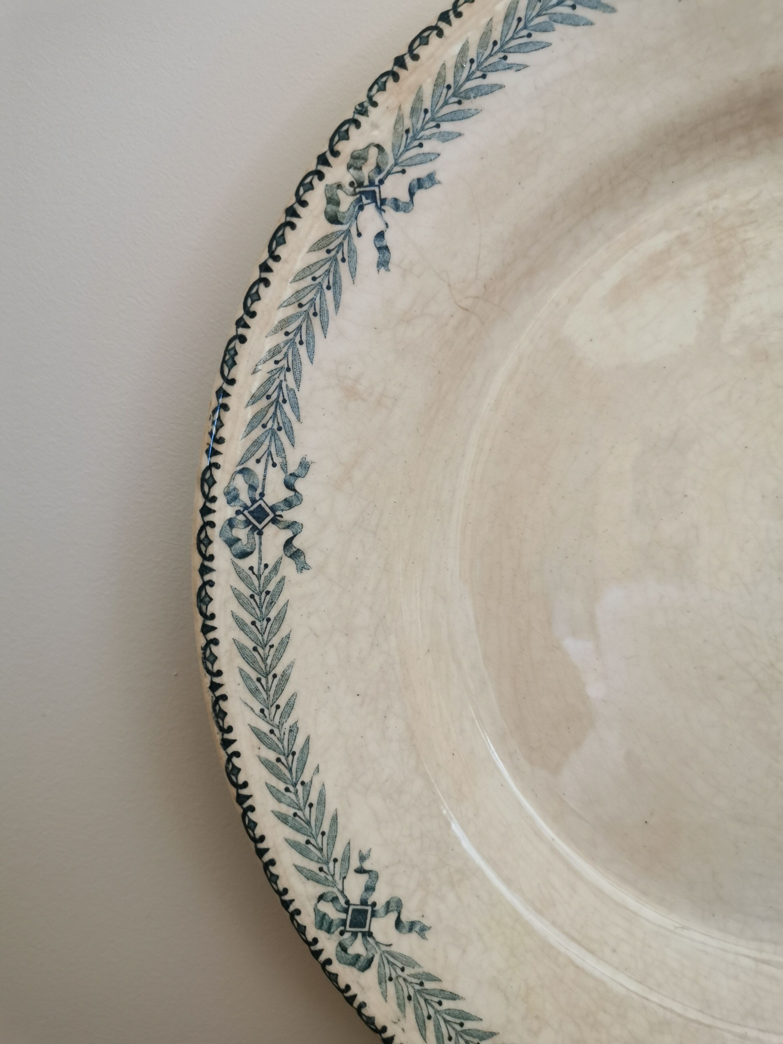 Large old round plate in iron earth