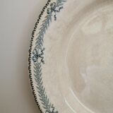 Large old round plate in iron earth