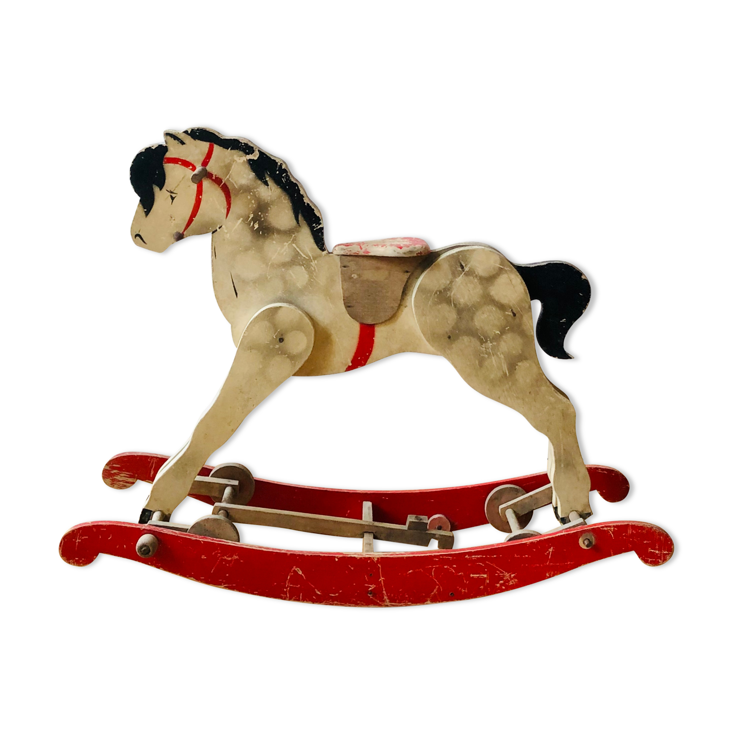 Cheval en bois ancien à bascule et à roulettes